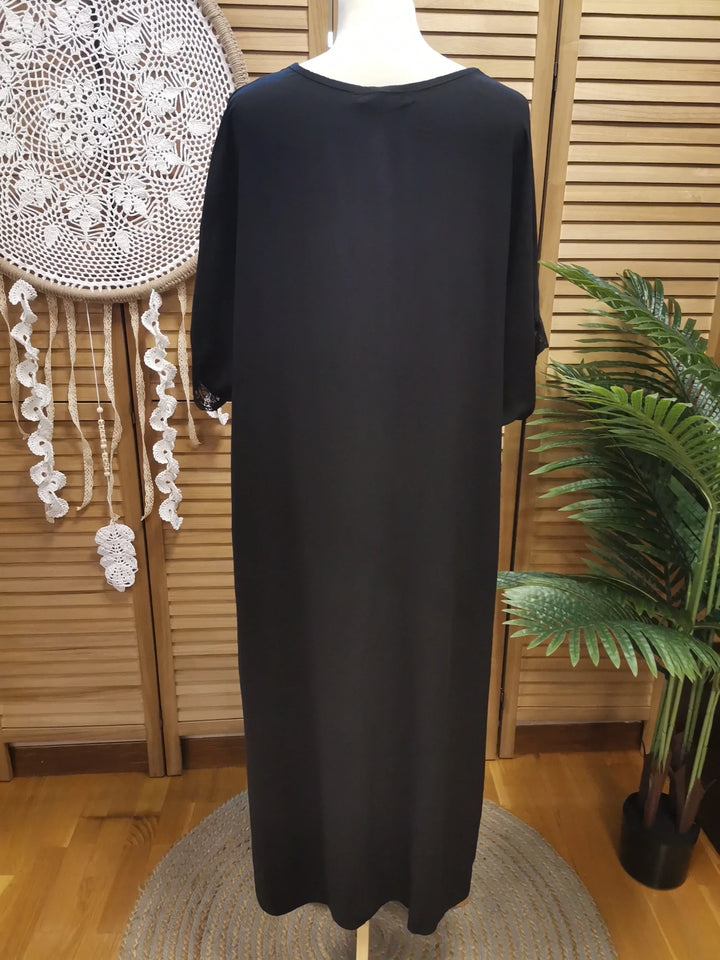 ROBE NOIRE BORDS DENTELLE LINETTE